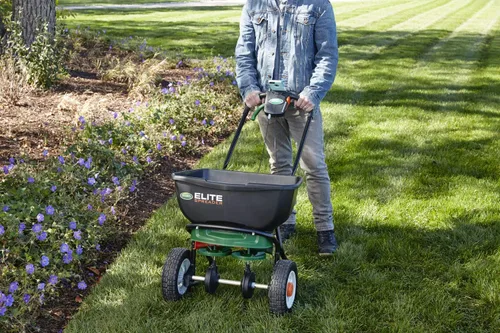 Miniatura 5 de Scotts Esparcidor Elite para semillas de césped, malezas y fertilizante, sal y derretimiento de hielo, esparcidor de empuje duradero con capacidad