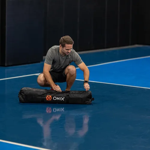 Miniatura 20 de ONIX Pickleball 2 en 1 Juego de red portátil de tamaño reglamentario y red de práctica incluye estuche de transporte con ruedas