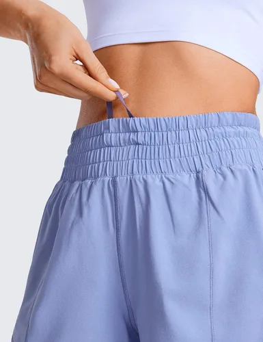 Miniatura 101 de CRZ YOGA Pantalones cortos de correr de cintura alta para mujer de 2.5 pulgadas, forro de malla de secado rápido para entrenamiento deportivo