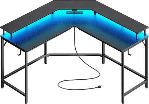 Huuger Escritorio para juegos en forma de L con tomas de corriente y luces LED, escritorio para computadora con estantes para monitor, escritorio de