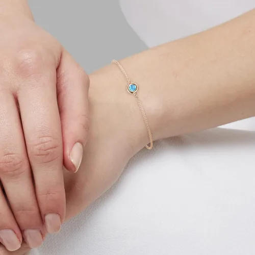 Miniatura 4 de Pulsera minimalista de topacio azul redondo de 0.14 quilates, oro de 14 quilates