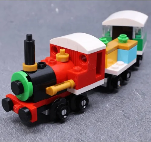 Miniatura 3 de LEGO Creator 30584 Tren Navideño de Vacaciones de Invierno con Locomotora, Vagón Plataforma y Carruaje (73 Piezas)