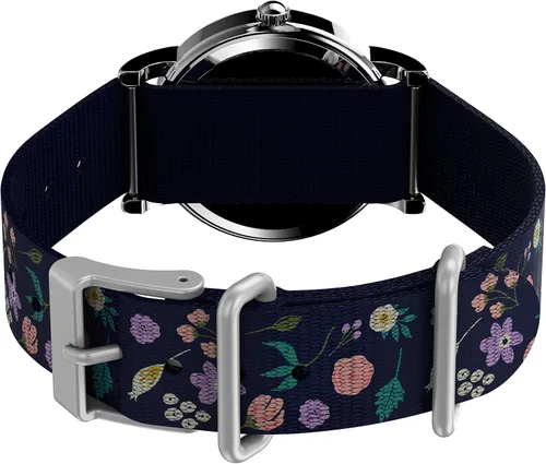 Miniatura 4 de Timex Reloj de pulsera para mujer Peanuts Weekender casual con Snoopy y Woodstock en un motivo floral estuche plateado con correa de tela azul