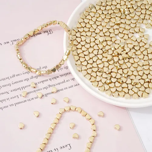 Miniatura 4 de Whaline 600 cuentas acrílicas doradas en forma de corazón con cuerda elástica para hacer joyas, bricolaje y decoración del hogar Dorado