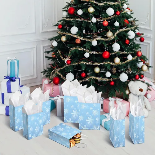 Miniatura 7 de Jectivs Paquete de 24 bolsas de regalo para fiestas, bolsas grandes y gruesas de papel kraft blanco con copos de nieve azul hielo con tejido blanco