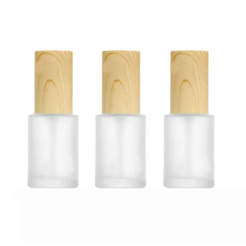 Paquete de 3 botellas vacías de loción de vidrio esmerilado de 1.0 fl oz / 1 onza líquida con bomba de plástico de grano de madera, contenedor de