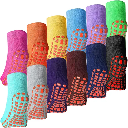 12 pares de calcetines antideslizantes para niños y niñas, como se muestra en las fotos