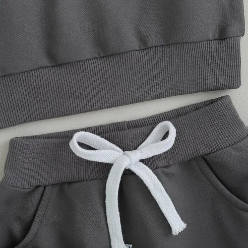 Miniatura 4 de Conjunto de camiseta de manga larga con cuello redondo a rayas y pantalones sólidos con cordón ajustable