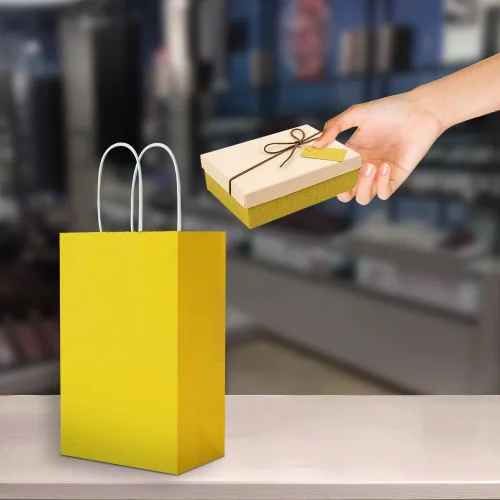 Miniatura 7 de Oikss Paquete de 100 bolsas pequeñas de papel kraft amarillas de 5.25 x 3.25 x 8.25 pulgadas con asas a granel para cumpleaños, bodas, fiestas