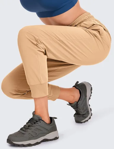 Miniatura 5 de CRZ YOGA Pantalones deportivos para mujer, impermeables, para exteriores, golf, atléticos, ligeros, con bolsillos con cremallera, de 27 pulgadas