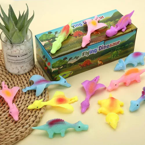Miniatura 4 de 20 Piezas Juguetes de Dedo de Dinosaurio con Tirachinas, Juguetes de Halloween Regalos de Fiesta para Niños Goma Pegajosa Dino Catapulta Voladora
