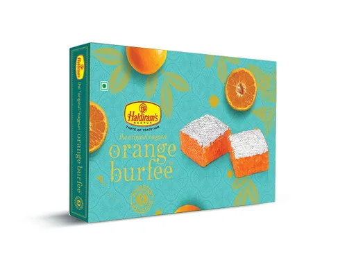 Miniatura 4 de Haldiram's Nagpur Naranja Burfee 17.64 oz, Moong Dal (7.05 oz),Lite Chiwda (200 gm) con Diya grande