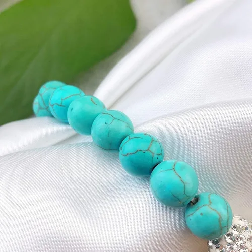Miniatura 4 de Bocar Pulsera elástica de cuentas de cristal con cruz lateral chapada en metal