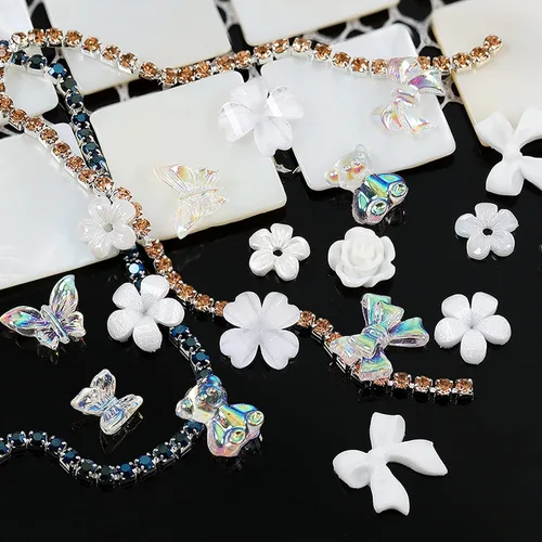 Miniatura 4 de Dijes de acrílico 3D con diseño de mariposa, flores blancas, osos para uñas, bonitos dijes de uñas, diamantes de imitación de cristal estrellado