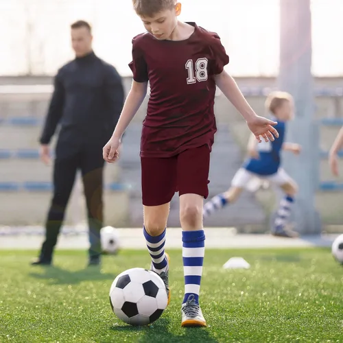 Miniatura 5 de TYCTOS Pantalones cortos deportivos para niños, elásticos, de secado rápido, pantalones cortos deportivos de fútbol para niños con bolsillos