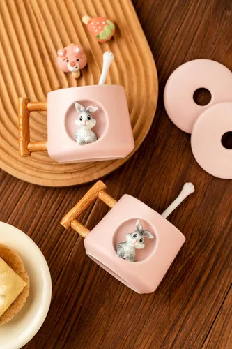 Miniatura 9 de DIHOclub Adorable Taza de Cerámica 3D de Conejo con Tapa y Cuchara Perfecta para Café, Té, Leche y Más - Regalo Ideal para Amantes de los Conejitos