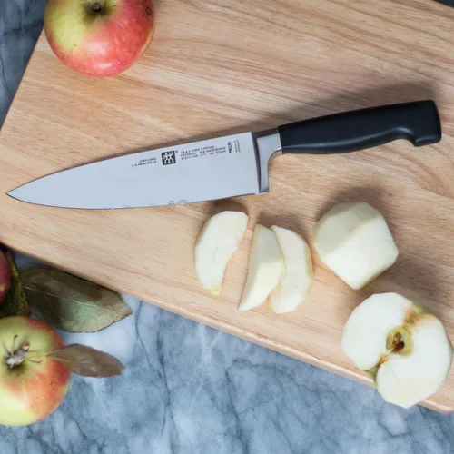 Miniatura 9 de ZWILLING - Cuchillo de chef alemán afilado de cuatro estrellas de 8 pulgadas, fabricado en una fábrica alemana propiedad de la empresa con acero