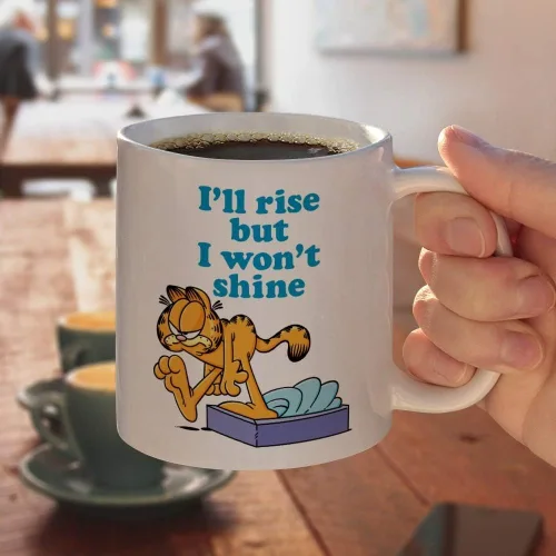Miniatura 4 de GRAPHICS & MORE Garfield - Taza de café de cerámica con texto en inglés "I'll Rise but I won't Shine", tazas de regalo novedosas para café, té