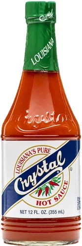 Miniatura 12 de Crystal Louisiana's Pure Hot Sauce con ajo, 12 onzas, pimientos de cayena añejos, calor medio, sabor Gumbo a Bloody Mary's
