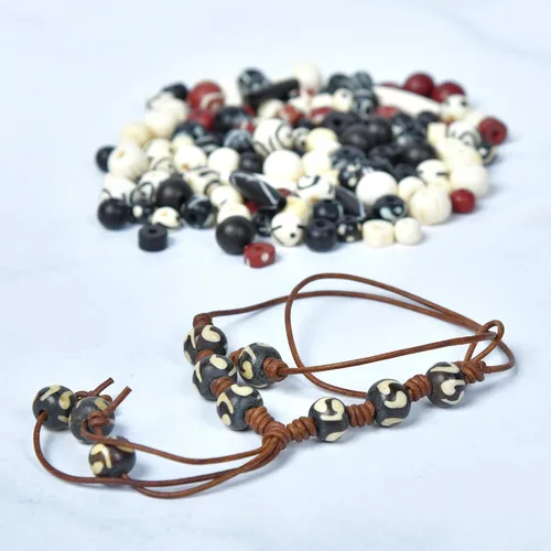 Miniatura 4 de Surtido de cuentas de hueso talladas a mano para hacer joyas y manualidades, 130 piezas, cuentas naturales africanas y nativas americanas en negro