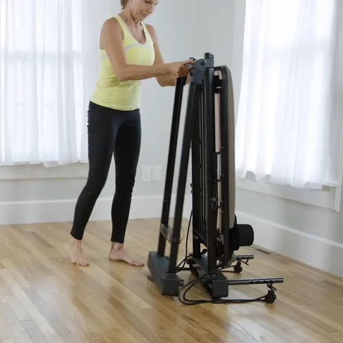 Miniatura 4 de Stamina Products AeroPilates Reformer 651 Máquina de entrenamiento de resistencia para todo el cuerpo para gimnasio en casa con soporte de 10