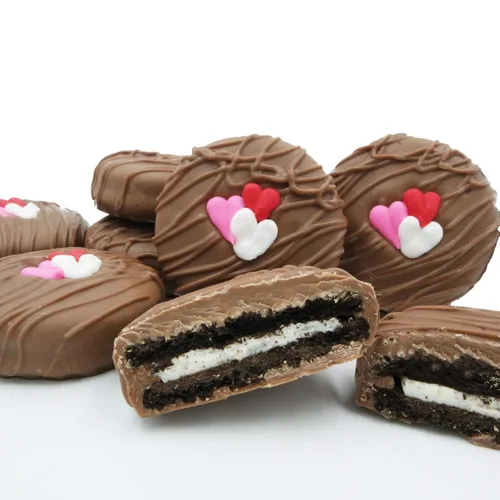 Miniatura 23 de Galletas de la marca Philadelphia Candies cubiertos por ambos lados de chocolate negro y con leche, y crema de cacahuete de la marca Nutter Butter