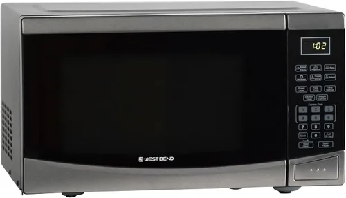 Miniatura 8 de Horno microondas West Bend WBMW92B de 900 vatios, compacto con 6 configuraciones pre-cocción, descongelamiento rápido, panel de control electrónico