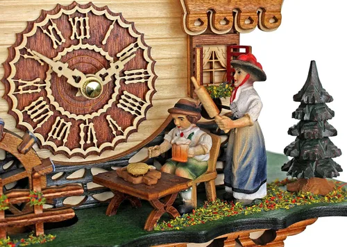 Miniatura 3 de Trenkle Reloj de cuco de cuarzo Casa de la Selva Negra con Mujer de la Selva Negra en Movimiento y Rueda de Molino, con Música TU 4215 QM