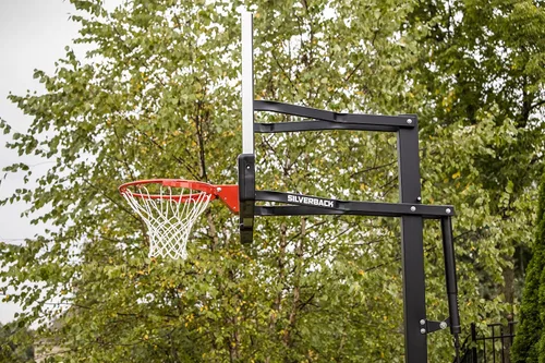 Miniatura 9 de Silverback Aro de baloncesto de altura ajustable en el suelo con tablero de vidrio templado, borde de separación profesional y almohadilla de tablero