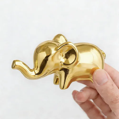 Miniatura 2 de OwMell Decoración de elefante de buena suerte para el hogar, pequeña estatua de elefante de cerámica para decoración del hogar, chapada en oro
