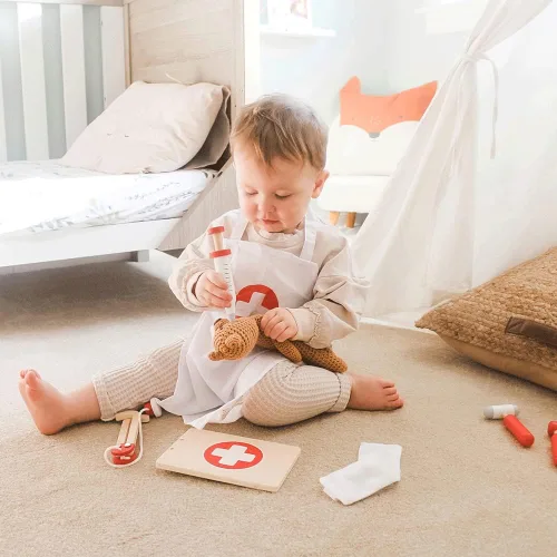 Miniatura 8 de Bigjigs Toys Juego de médicos para niños, juego de médicos de madera de 10 piezas con estetoscopio para niños, termómetro, medicina y más en estuche