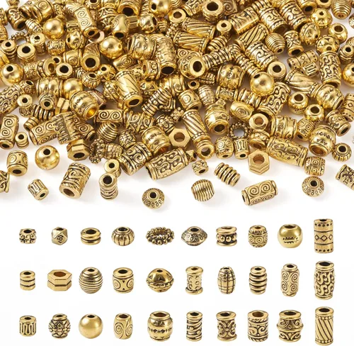 Craftdady 300 piezas Cuentas espaciadoras de aleación tibetana dorada antigua 30 estilos surtidos Cuentas de columna poligonal asimétrica, cuentas