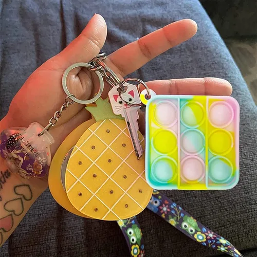 Miniatura 3 de 100 piezas de mini llavero de color aleatorio, juguete sensorial de silicona para apretar burbujas que hacen divertido para niños, alivio