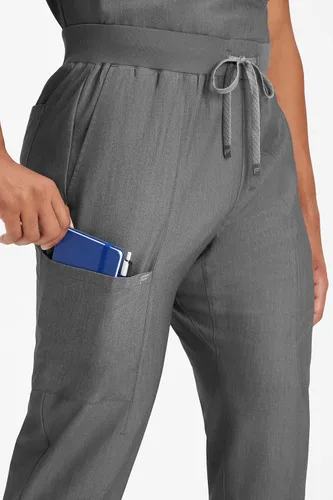 Miniatura 3 de Fabletics MotionTech - Pantalón médico para hombre, elástico en 4 direcciones, con bolsillos, resistente a las arrugas, ajuste semidelgado