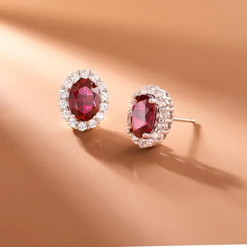 Miniatura 3 de Amazon Essentials Aretes ovalados de plata de ley con halo de zafiro blanco, (anteriormente colección Amazon)