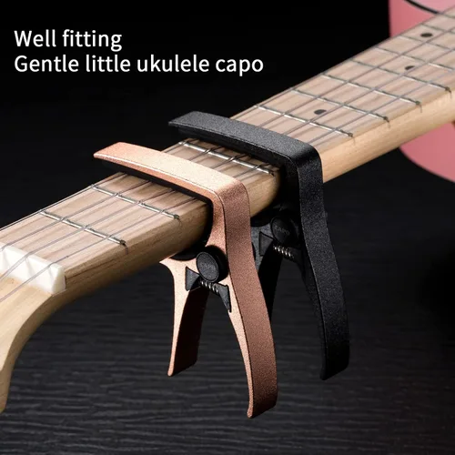 Miniatura 3 de Cejilla de ukelele para guitarra de 4 cuerdas y mandolina, cejilla profesional para ukelele de tamaño mini (Negro)