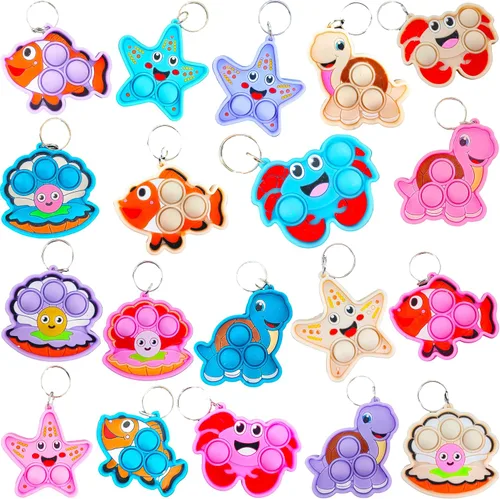 Paquete de 25 llaveros a granel de burbujas para ansiedad, cangrejos, peces, conchas, estrellas, tortugas, animales del océano, juguetes para niños,