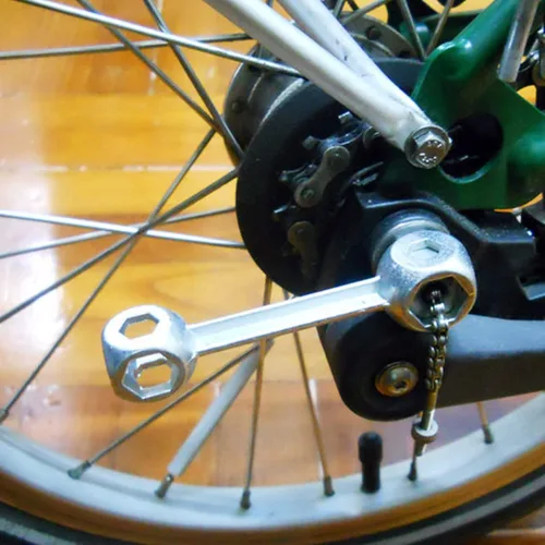Miniatura 5 de Llave 10 en 1 Herramienta de reparación de bicicletas portátiles con forma de hueso de perro, llave dinamométrica, agujeros hexagonales, llave