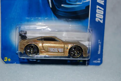 Hot Wheels Mattel 2007 All Stars Series 1:64 - Coche de metal fundido a presión N.º 152 de 180 – Gold Sport Coupé Nissan Z con alerón negro y datos