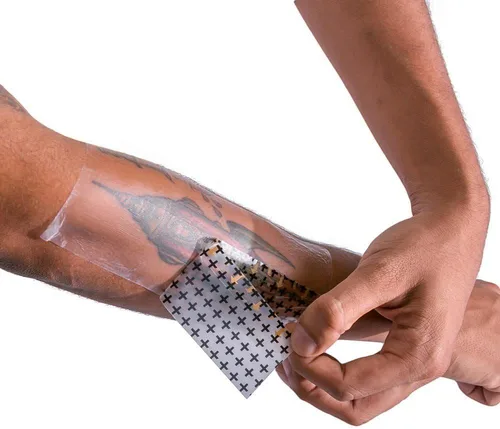 Miniatura 5 de Recovery Derm Shield - Rollo de vendas para el cuidado posterior de tatuajes, adhesivas, transparentes e impermeables
