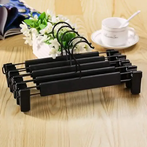 Miniatura 7 de Perchas para pantalones, perchas para faldas, paquete de 20 perchas de plástico negro para pantalones con clips grandes antideslizantes y 360