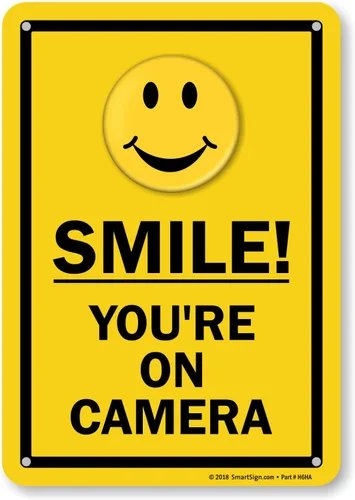 SmartSign Letrero de metal con la frase "Smile You're On Camera" de 10 x 7 pulgadas con agujeros pre-limpiados, aluminio laminado inoxidable de 40
