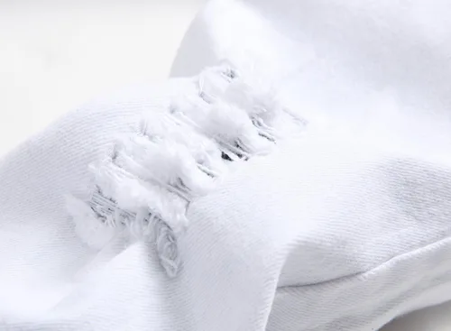 Miniatura 3 de Jeans ajustados para niño, elásticos, de aspecto desgastado y desgarrado
