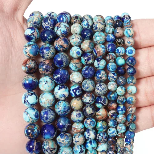 Miniatura 29 de 60 piezas de cuentas de piedra natural de 15⁄64 pulgadas (6 mm) con cuentas de apatita azul que es una piedra para sanación de la energía. Piedras